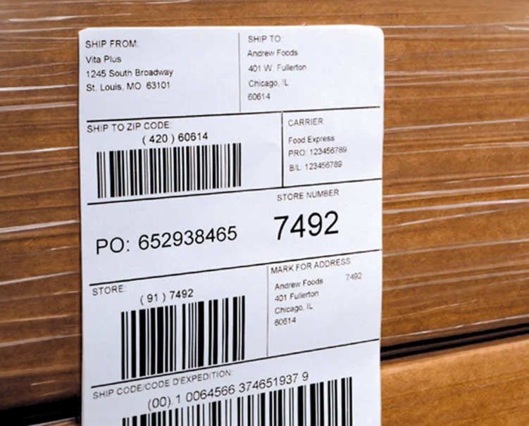 Worker scanning products in warehouse